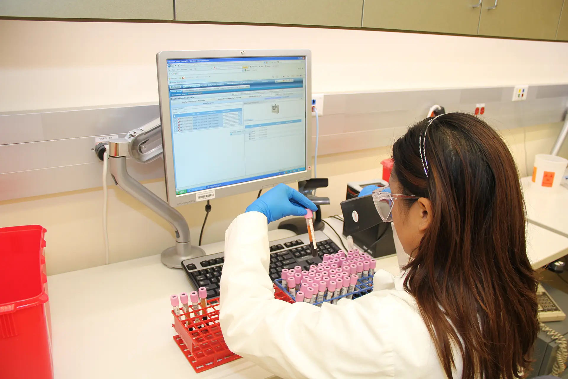 Technician with sample collection
