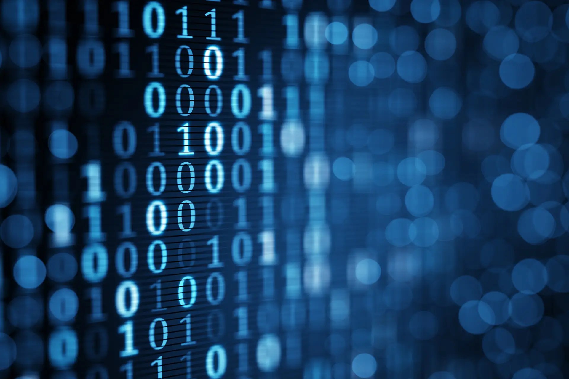 Blue digital binary data on computer screen